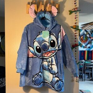 NWT Disney Stitch-themed oversized blanket hoodie, often referred to as a "s
